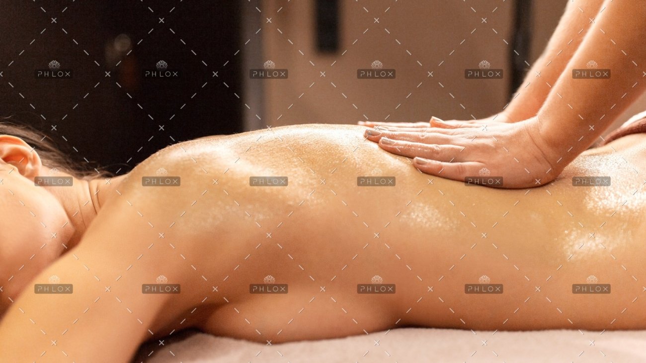 demo-attachment-391-woman-lying-and-having-back-massage-at-spa-P9T7TEZ