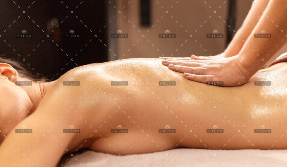 demo-attachment-391-woman-lying-and-having-back-massage-at-spa-P9T7TEZ